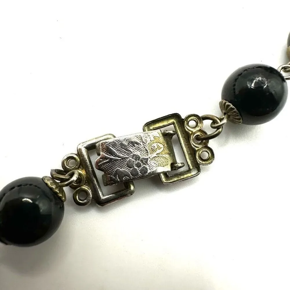 Vintage long black beaded necklace